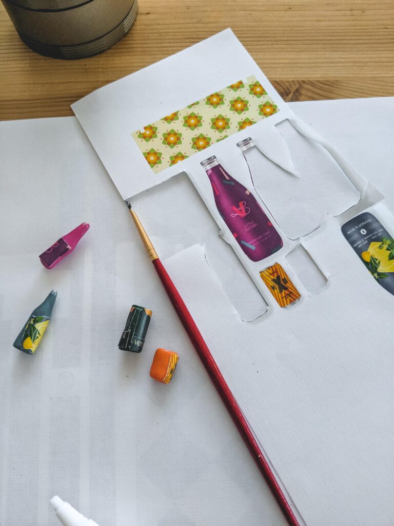 Printing to scale, then sticking to polymer clay shapes.