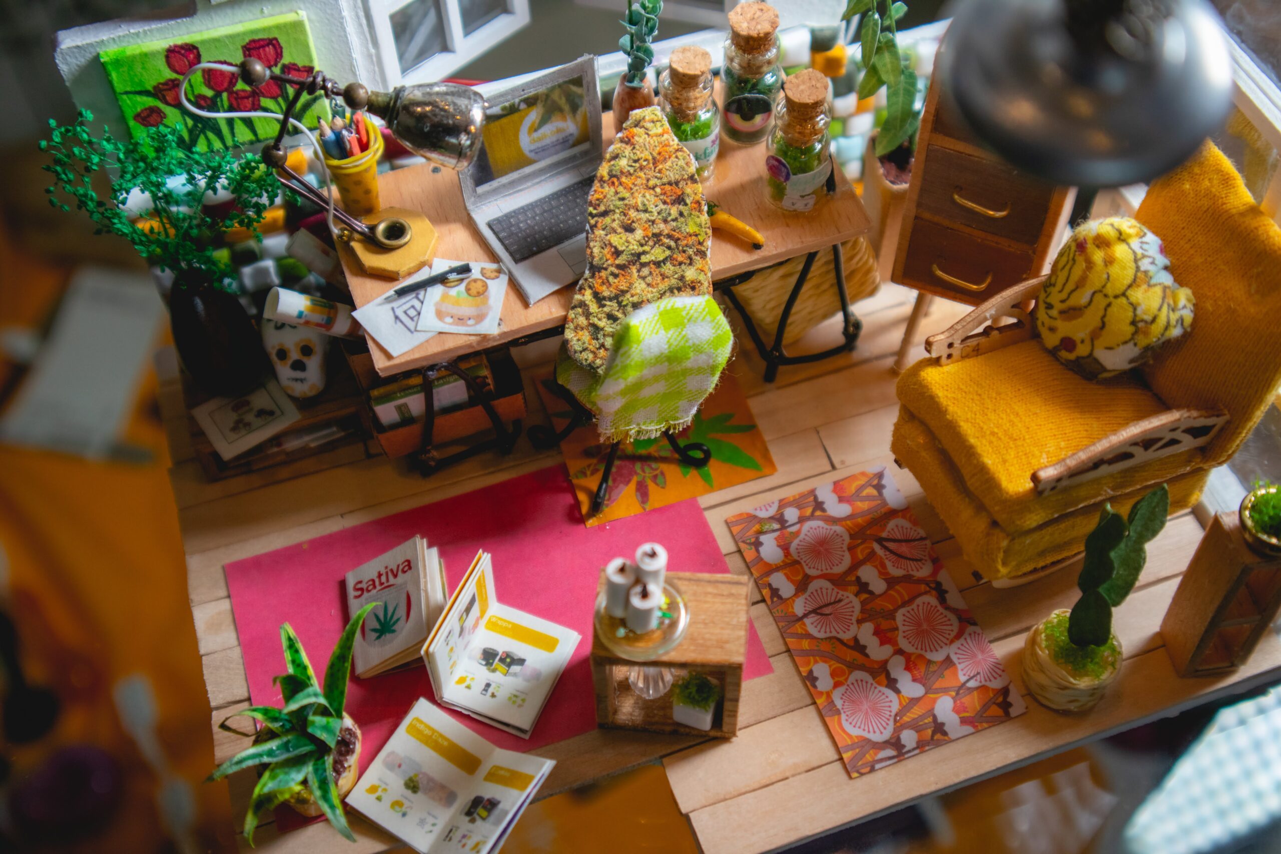 To provide scale, a cut out of a nug was used in the various miniatures. This nug in particular was very dutifully sitting at its desk. 

You can peek at the mosaic in the background. It's almost visible. If you squint.