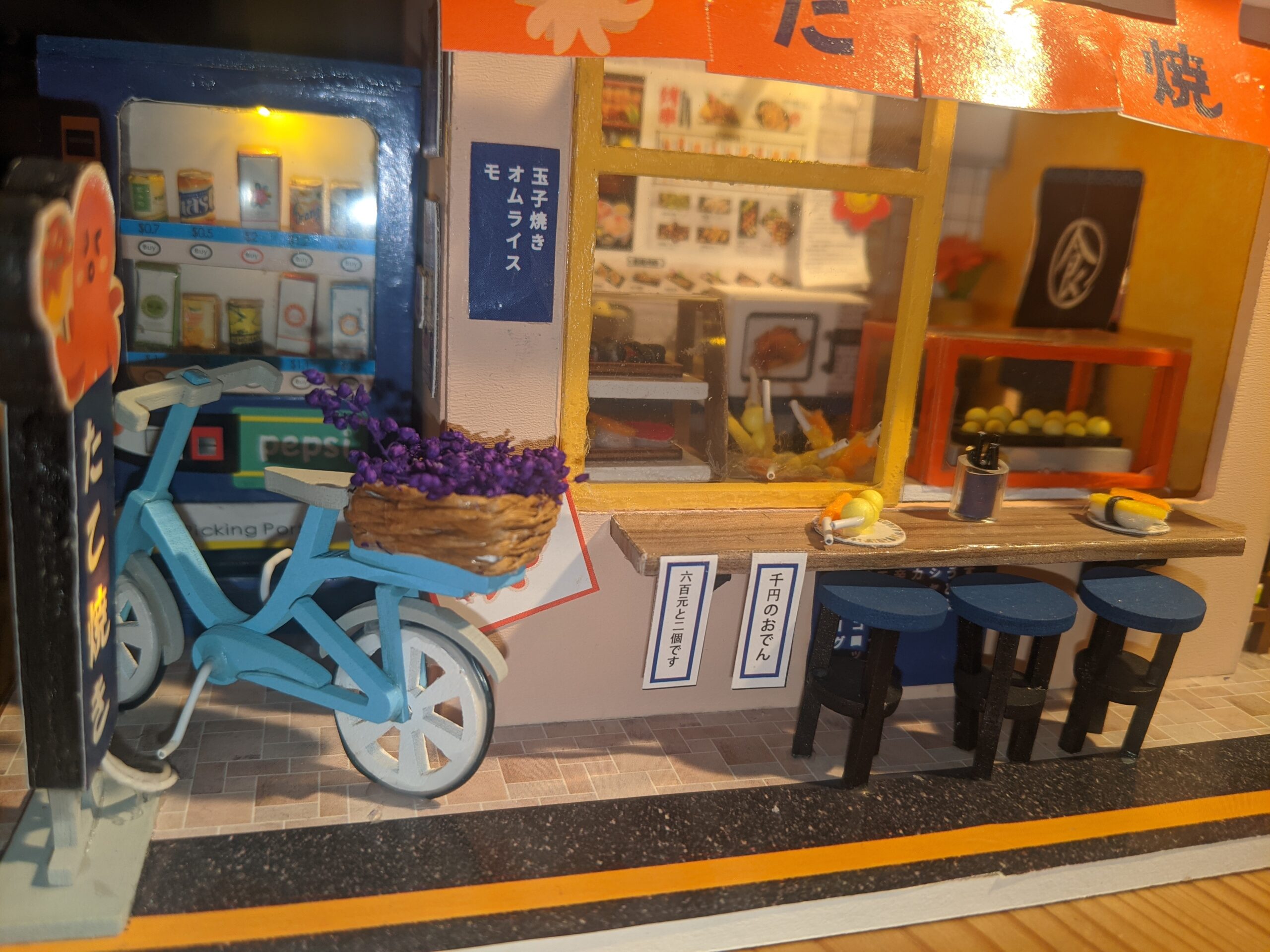 Miniature of a sushi shop Mimi built